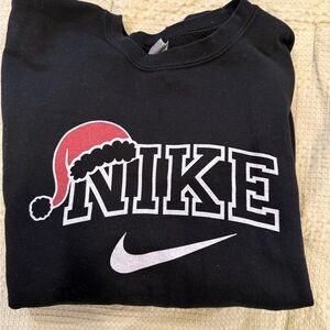 Nike Black Sweatshirt with Red Santa Hat Design